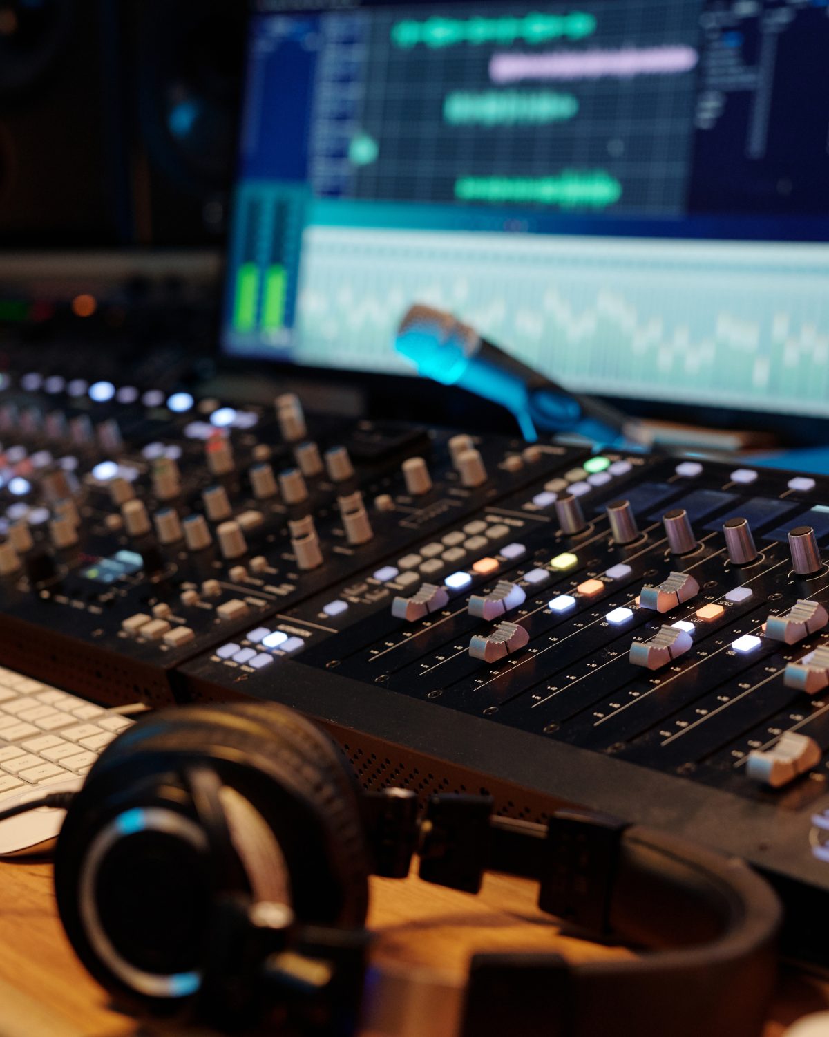 Mixing console and audio editing software in a professional podcast studio