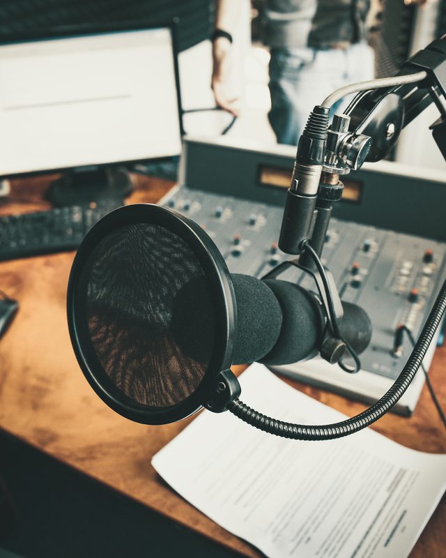 Professional podcast studio microphone set up for a B2B podcast recording session