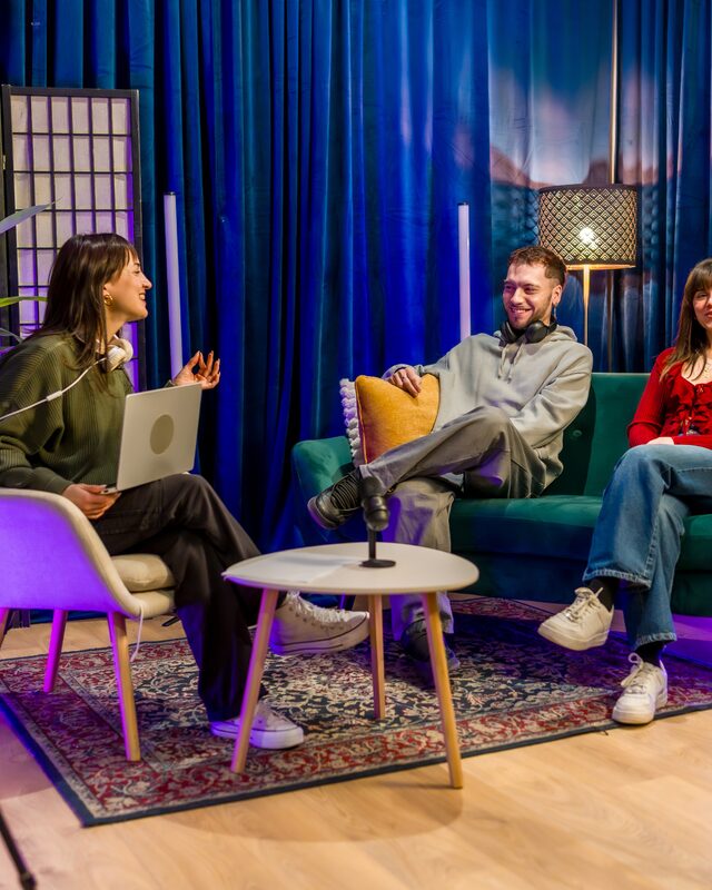 Video podcast interview being recorded on a professional studio set