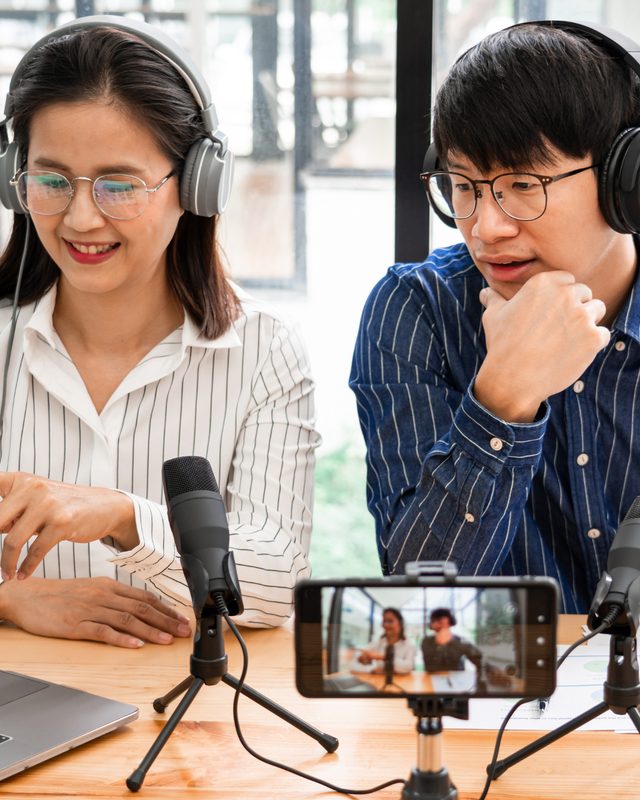 Magnetic Podcasting team in a strategy planning session with a client